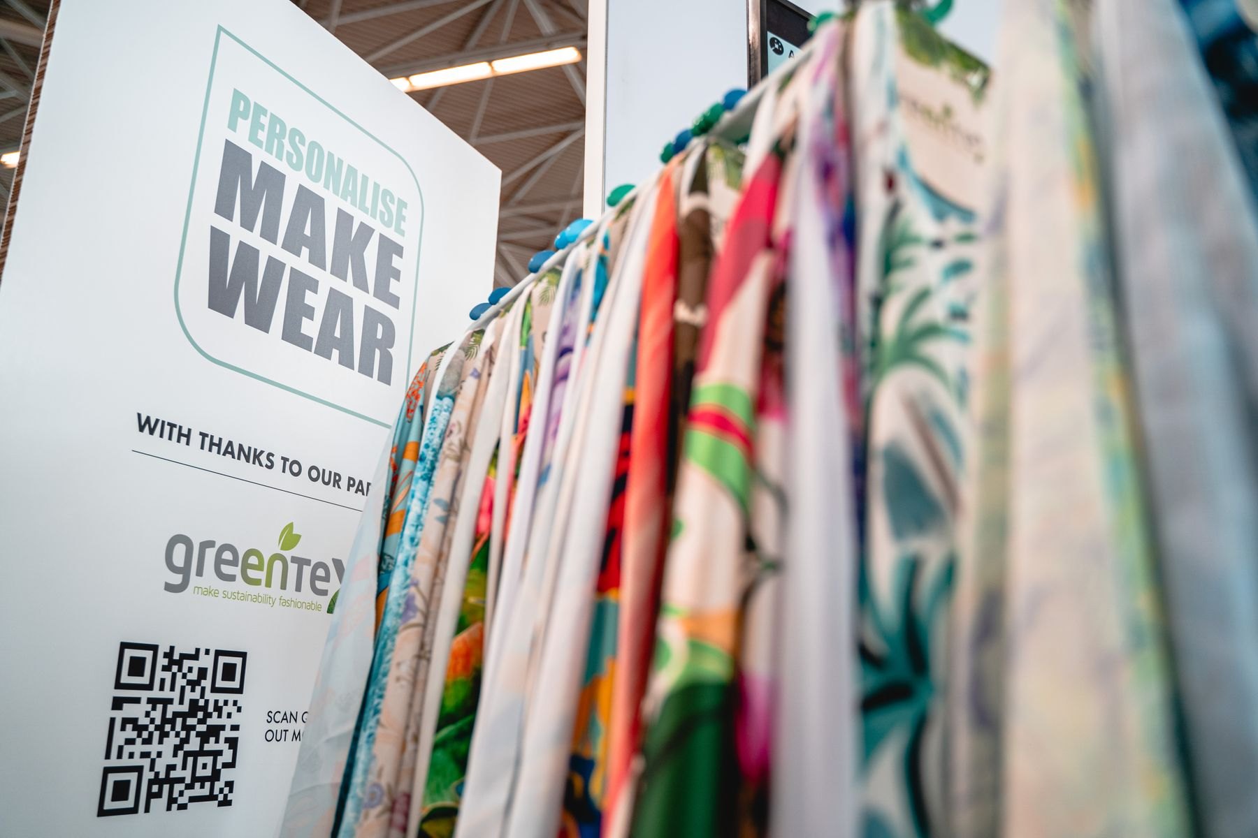 Rack of printed garments at the Print Make Wear feature